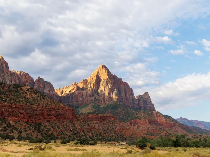 Scenic view of Zion National Park's red rocks and road at sunrise, Springdale, Utah.