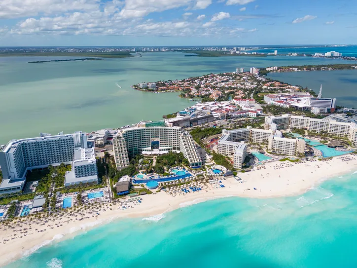 Stunning aerial shot of Cancun's pristine beaches and luxury resorts along the coast.