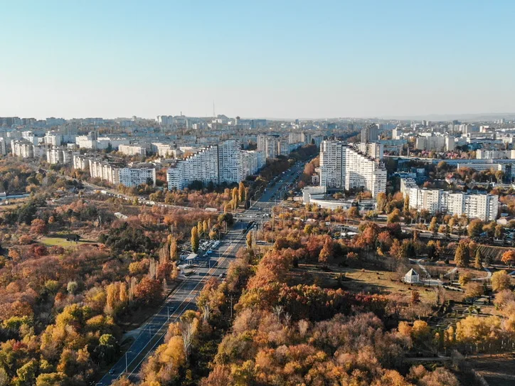 A stunning aerial shot capturing Chișinău, Moldova in vibrant autumn colors.