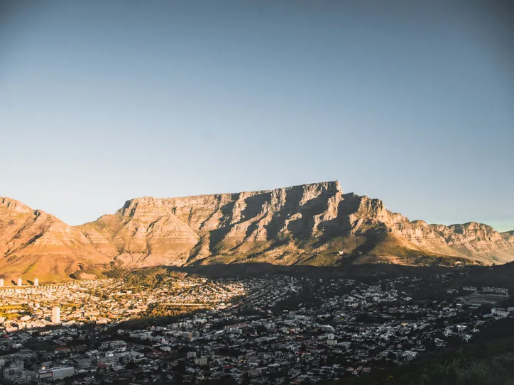 Table Mountain above Cape Town's city bowl at golden hour