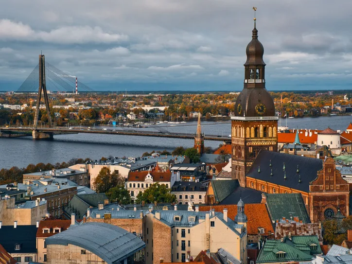 Aerial view of Riga, Latvia, showcasing the iconic Dome Cathedral and Daugava River.