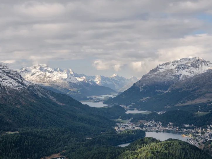 A stunning aerial view of the Swiss Alps and St. Moritz valley, captured in Graubünden, Switzerland.