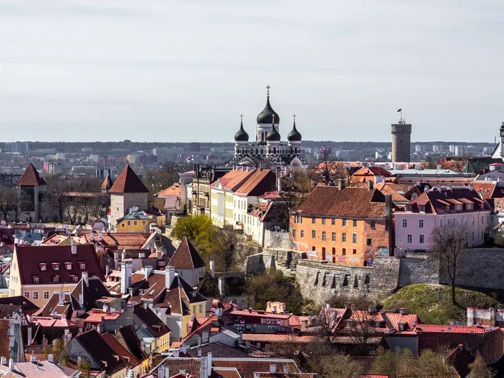 Scenic aerial view of Tallinn's old town with historic towers and rooftops.