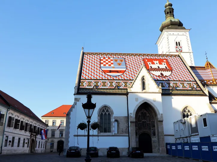 St. Mark's Church in Zagreb features a vibrant tiled roof with historic coats of arms.