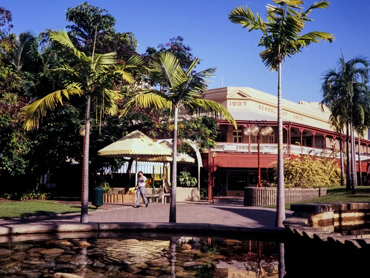 The 1907 School of Arts building with palm trees in Cairns, Queensland, Australia.